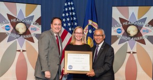 Emma Lehnhardt with NASA Associate Administrator Robert Lightfoot [L] and NASA Administrator Charlie Bolden [R]. accepting an award at NASA HQ Honors Awards ceremony on behalf of her team, who organized NASA's first FedStat meeting. FedStat is a new initiative to benchmark across all federal agencies and focus on mission performance.