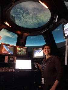 Anima Patil-Sabale working at NASA's Johnson Spaceflight Center in the ISS cupola module mock-up simulation lab -astronauts train in this lab to prepare for ISS missions [Anima Patil-Sabale]