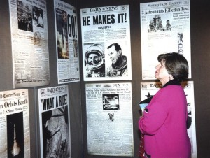 JoAnn Morgan studies posters of space-related news stories in the mobile exhibition when she was the associate director for Advanced Development and Shuttle Upgrades at KSC. Credit: NASA [3].