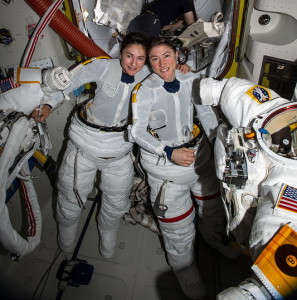 NASA Astronauts Jessica Meir (left) and Christina Koch (right) prepare to leave the Quest airlock of the International Space Station and begin the historic first-ever all-female spacewalk. [NASA]