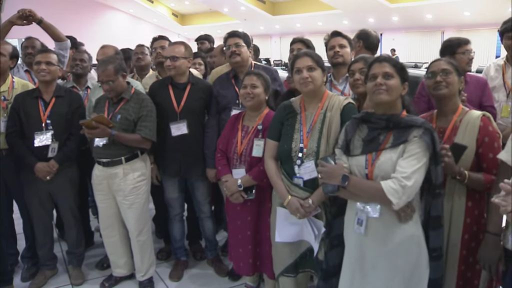 Chandrayaan-3 mission scientists and engineers celebrating as the lander safely touched down on the surface of the Moon