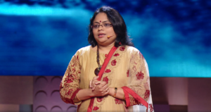 Ritu Karidhal Srivastava on stage during her 2017 TEDx talk titled 'How India Went To Mars'